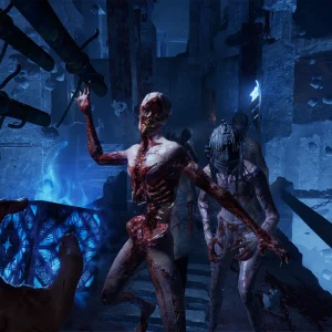 Two skinless, bloody creatures lunge at the player in collapsed ruins while the puzzle box glows blue in the player's hand