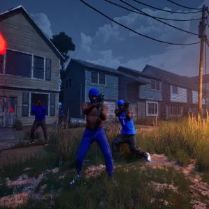 A squad of blue gang players with rifles moves through tall grass between wooden houses at sunset, beside a glowing red turf marker