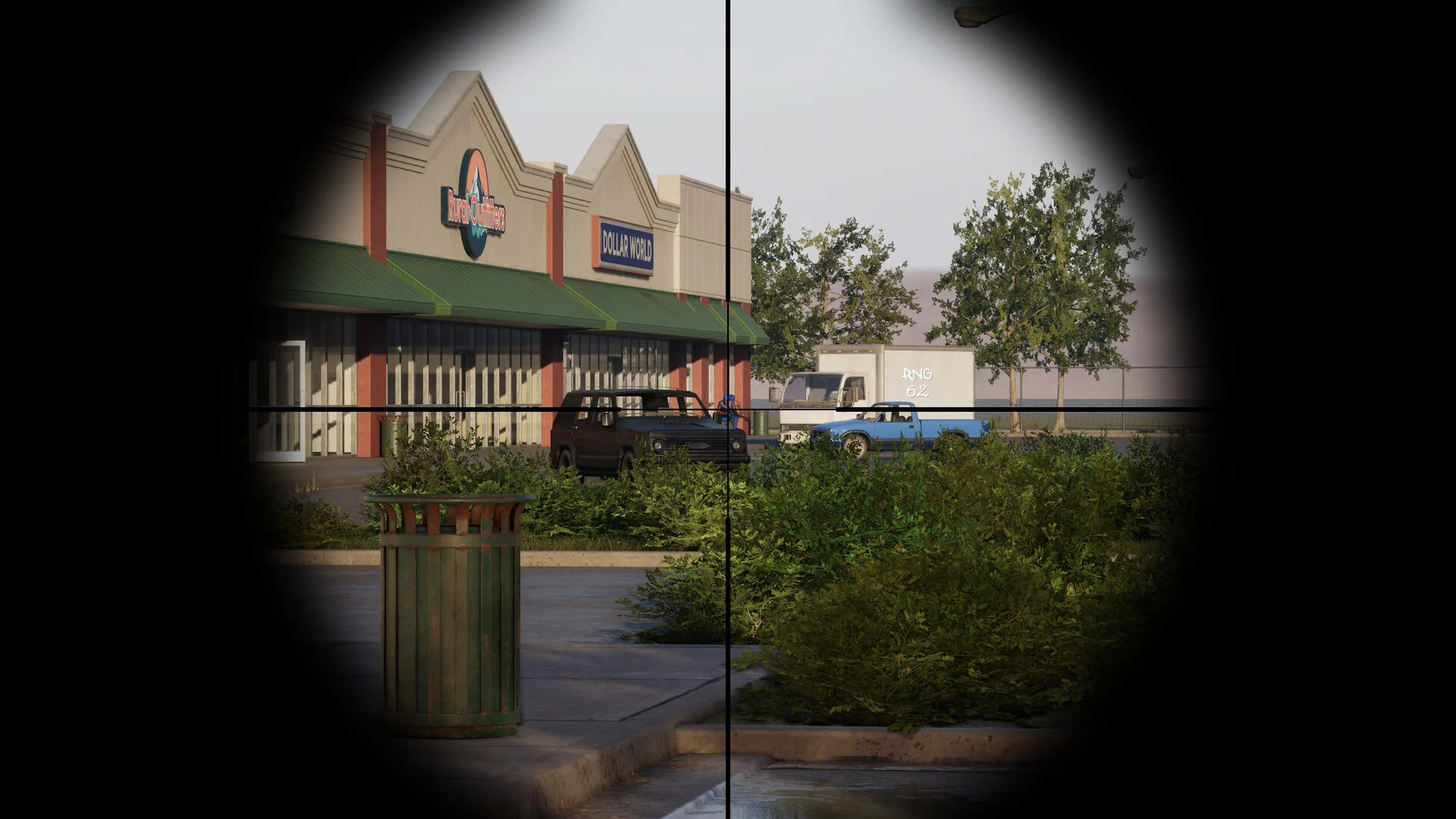 View through a sniper scope looking across a parking lot at a strip mall with parked cars and a Dollar World sign
