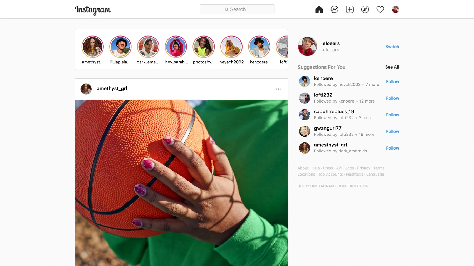 Instagram home feed on a PC with a row of stories at the top, a photo post in the middle and suggested accounts on the right