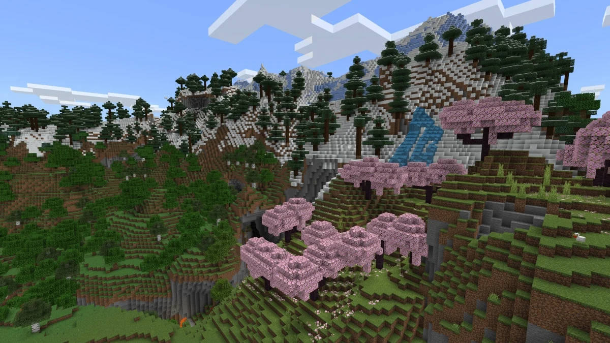 Pink cherry blossom trees and pine forest on blocky snow-capped Minecraft mountains