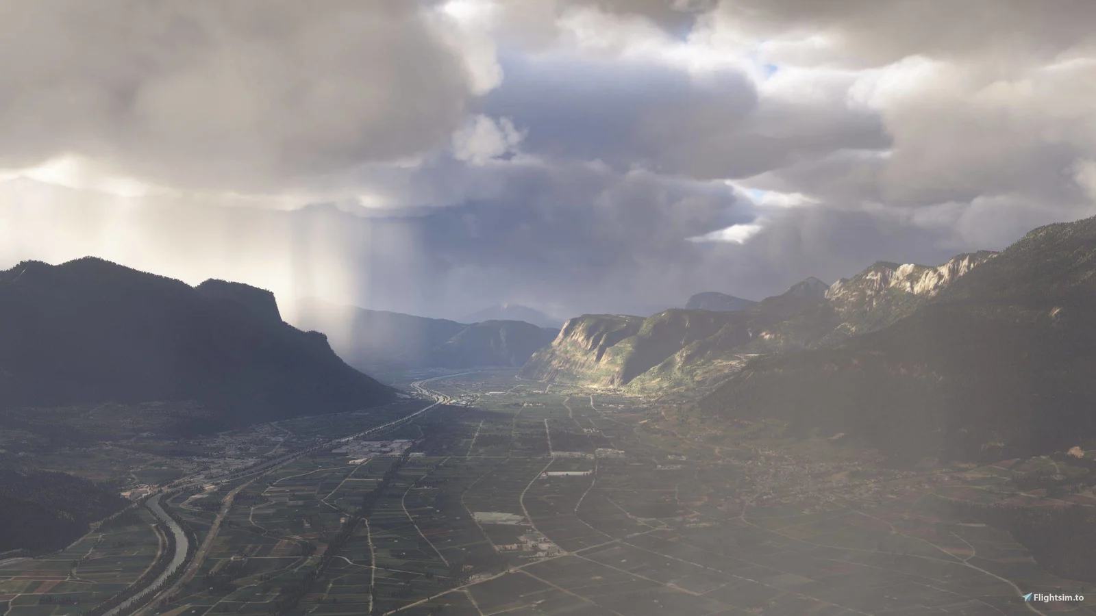 Storm clouds and rain shafts over a green alpine valley, made with a Floyds Epic Clouds weather preset in Microsoft Flight Simulator