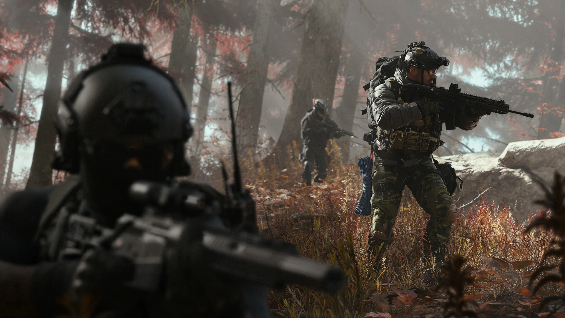 A squad of armed soldiers moves through a misty forest with red-leaved trees in Modern Warfare 4