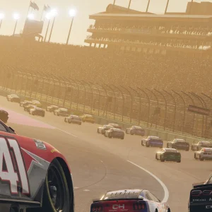 The No. 41 car leads a long pack of stock cars around an oval at sunset, with grandstands lit by low golden sunlight
