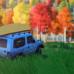 A blue 4x4 with a canoe strapped to the roof parks in tall grass among red, orange and yellow autumn trees