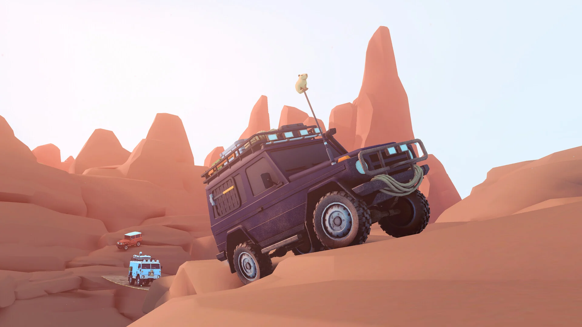 A dark 4x4 with a winch and a small mascot on its antenna climbs a steep sandstone slope as a van follows