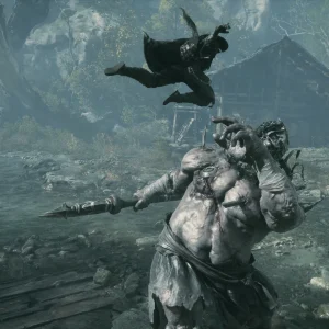 A huge pale brute with a spear lunges while Soul flips through the air above him outside a wooden hall