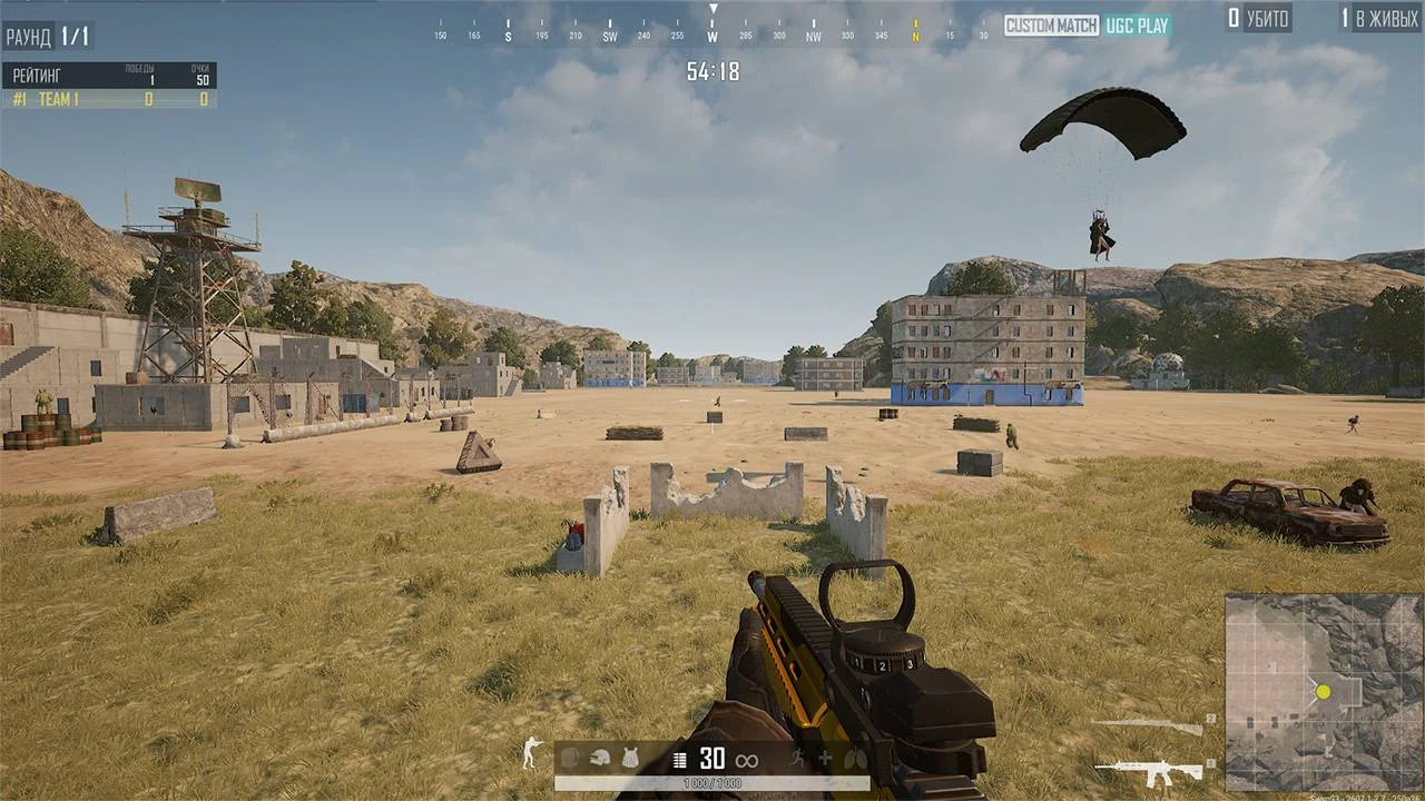 First-person view in a PUBG custom training map: a player with a scoped rifle on an open field, with a building and a parachuting bot in the distance