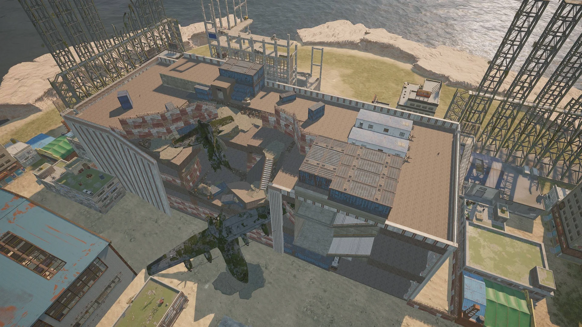 Overhead view of a shopping mall rooftop and steel frames where a PUBG zombie infection custom mode takes place