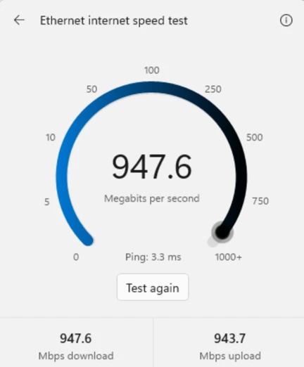 Internet speed test results in Windows 11 Quick Settings showing download speed, upload speed and ping