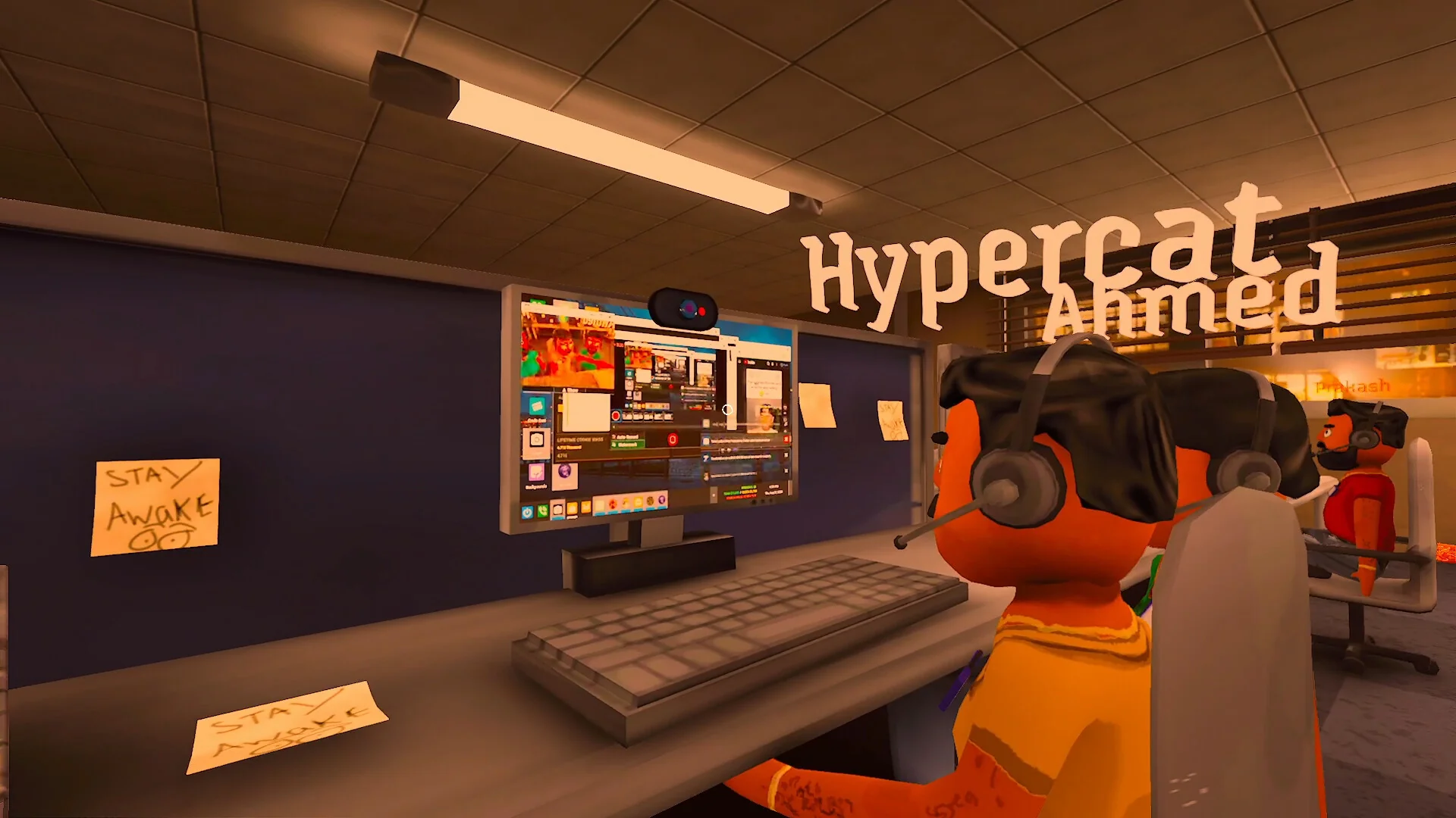 A player in a headset sits at a desk covered in sticky notes, one reading Stay Awake, in front of a computer