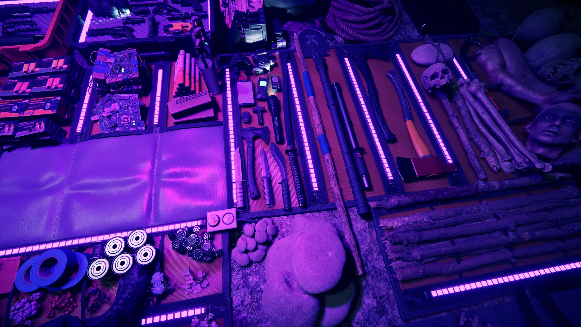 Top-down view of the crafting mat lit in purple, laid out with tools, weapons, batteries, rope and other gear