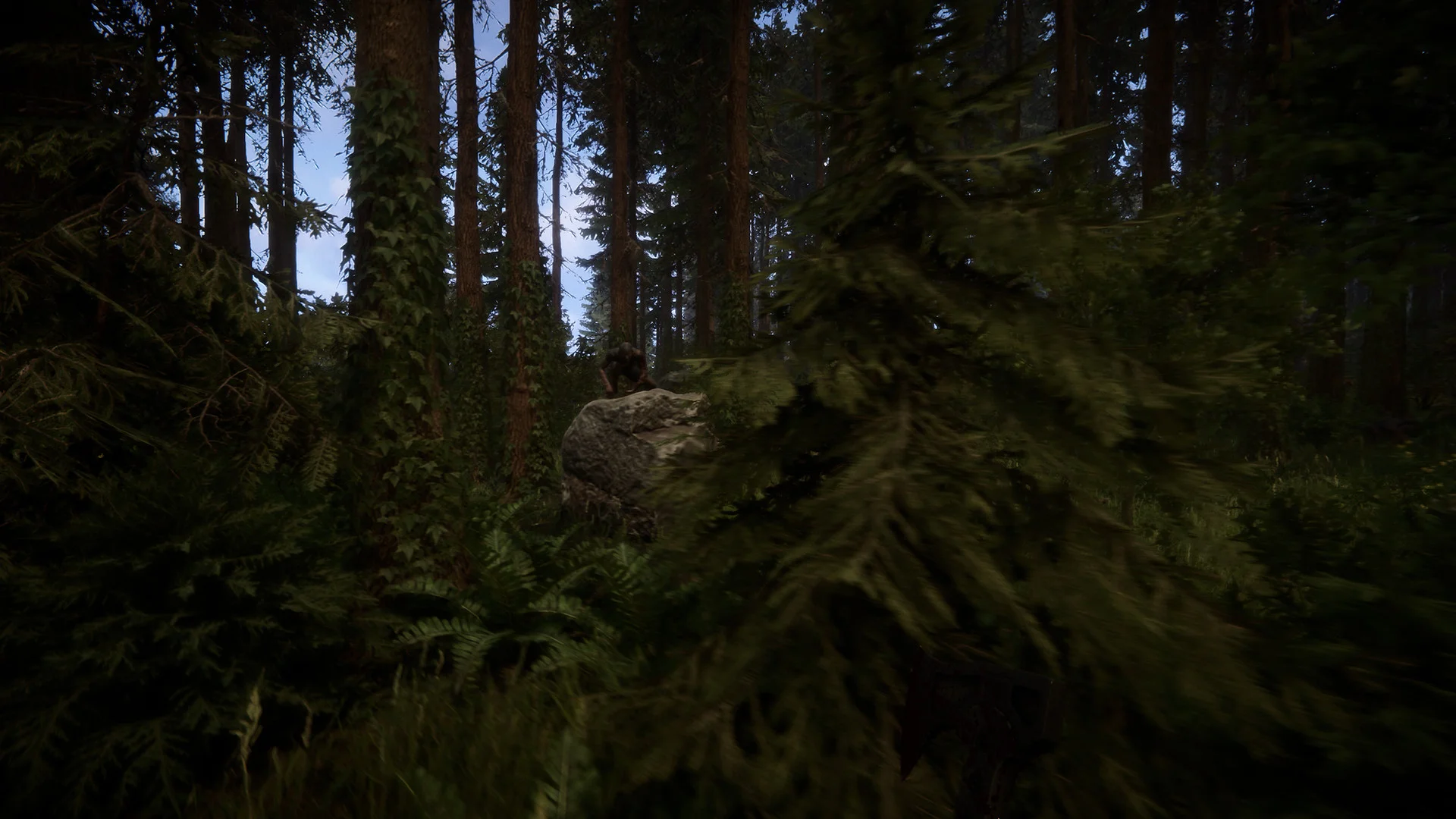 A cannibal crouches on a mossy boulder, half hidden behind pine branches in a dark forest