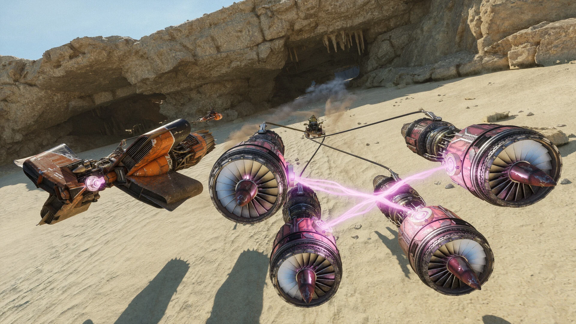 Two podracers with glowing pink energy binders race across the sand past a rocky cave in Star Wars Galactic Racer