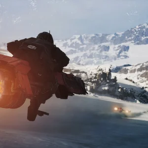 A racer leans into a speeder bike as it races down a snowy mountain valley