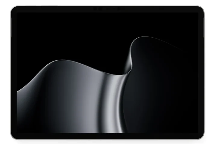 Front of a Platinum Surface Pro 12-inch with a black and silver ribbon wallpaper on screen
