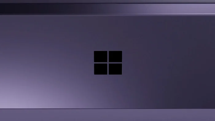 Close-up of the back of a violet Surface Pro 12-inch with the Windows logo in the center