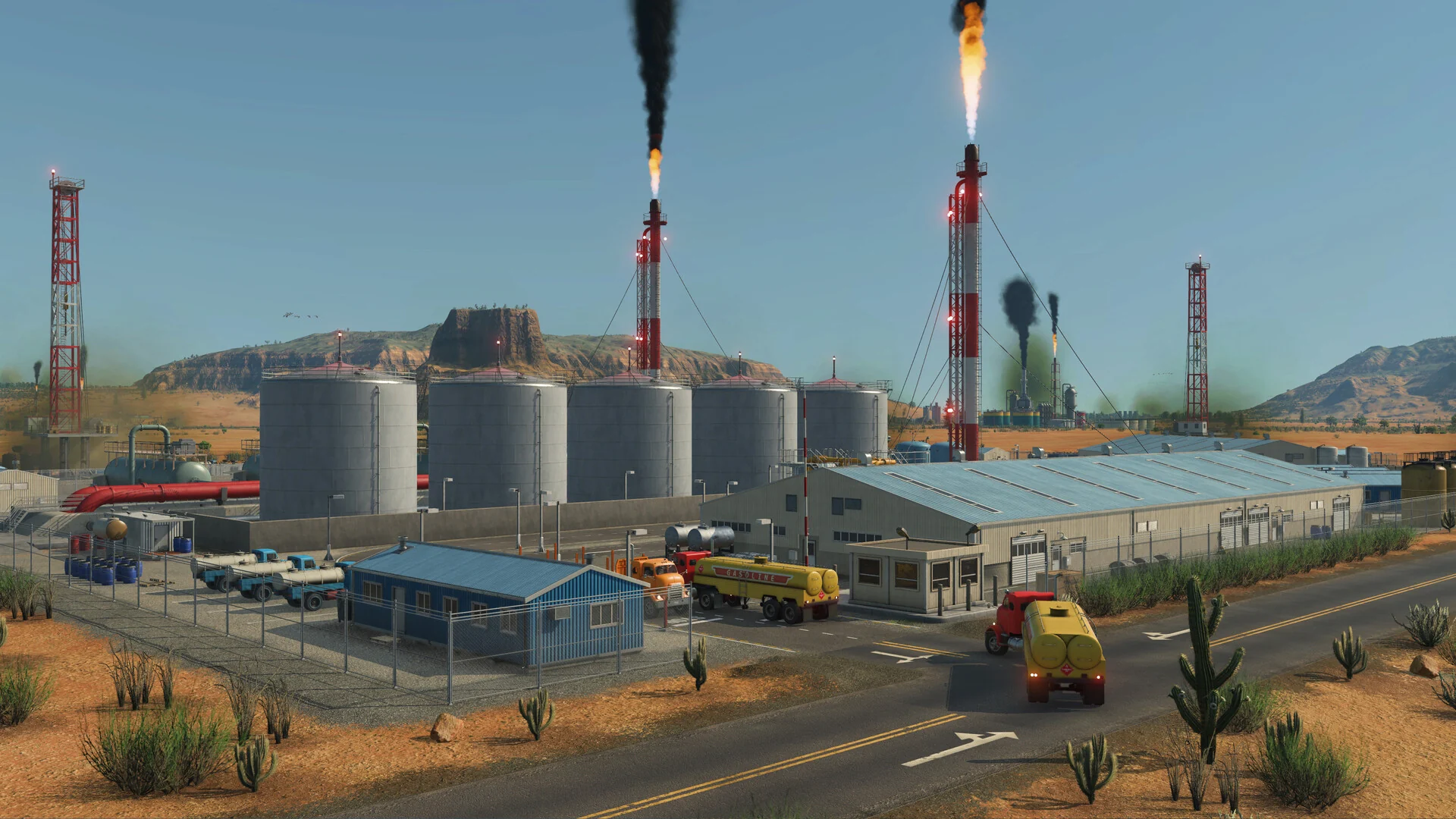 A desert oil refinery with storage tanks and flare stacks, tanker trucks parked outside and a red passenger train passing in Transport Fever 3